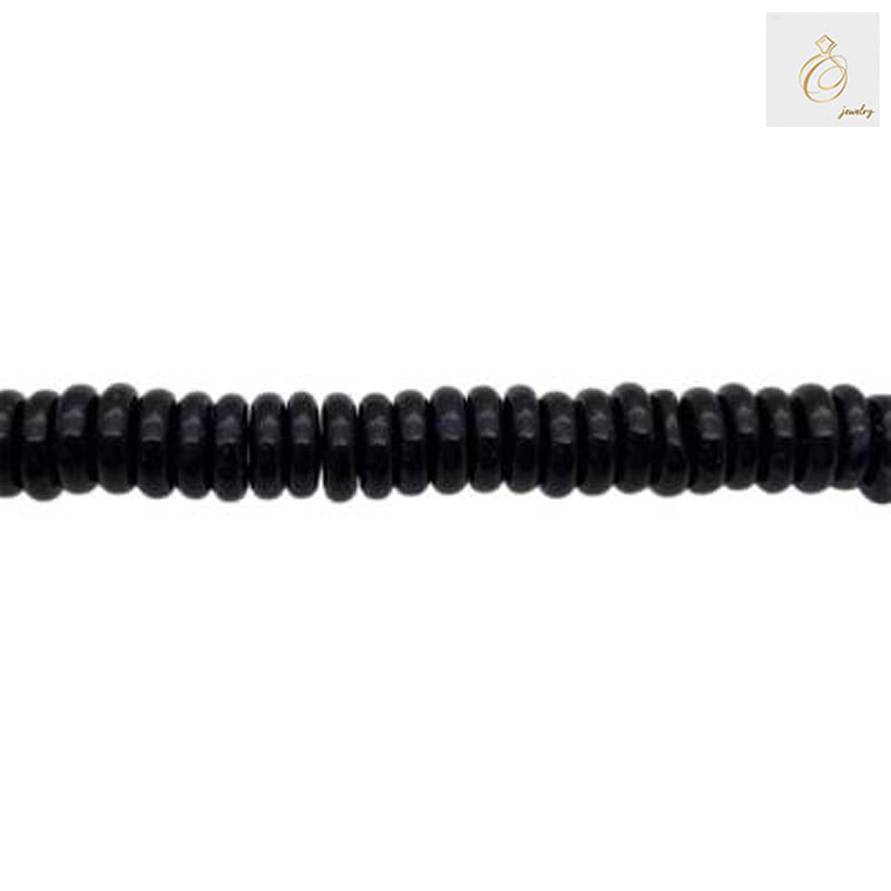 Black Agate Heishi Beads arranged in multiple strands showing texture and quality