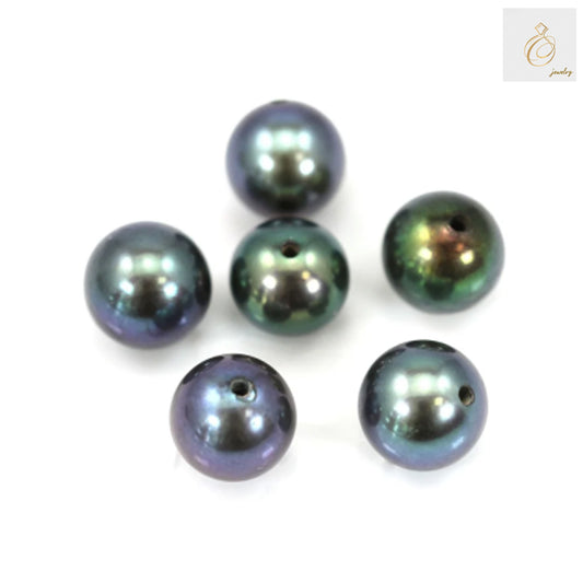 Close-up view of dark blue freshwater cultured pearls showing lustrous surface and round shape, 4.5-5mm size