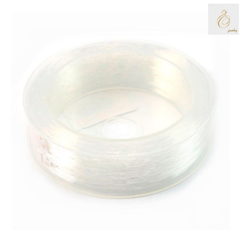 Premium elastic thread 0.5mm diameter, 100m roll for jewelry making and crafts"
"Clear elastic beading thread 0.5mm x 100m spool"
"High-quality elastic thread for jewelry making, 0.5mm thickness
