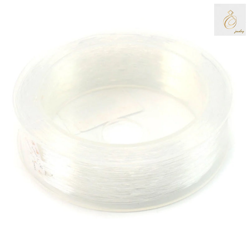 Premium elastic thread 0.6mm diameter on 90-meter spool for jewelry making and craftsClose-up view of 0.6mm elastic thread showing smooth texture and flexibility