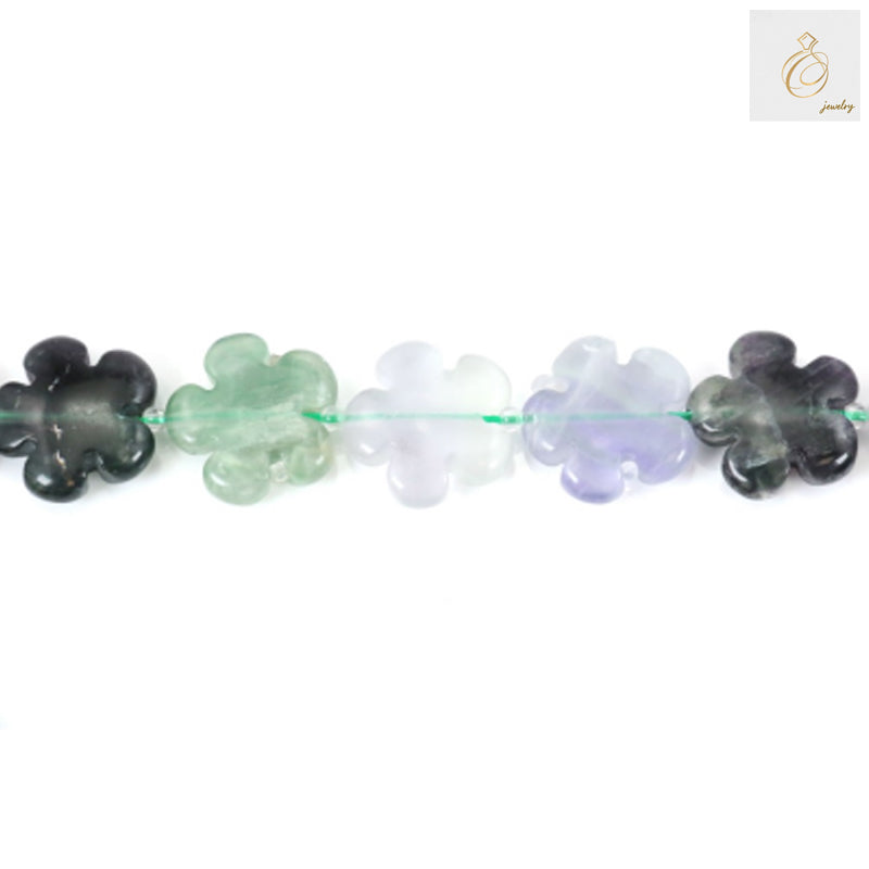 Natural fluorite flower beads 20mm diameter on 39cm strand"
"Purple fluorite gemstone beads with carved flower design"
"Translucent fluorite beads for jewelry making, 20mm size"
"Hand-carved fluorite flower beads showing natural stone patterns