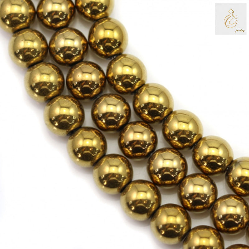 Close-up view of golden hematite beads strand showing 8mm round shape and consistent sizing