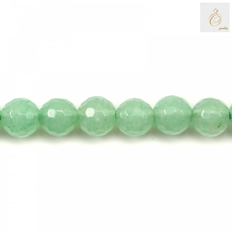 Close-up view of green aventurine 6mm round beads displaying natural stone texture and precision faceting