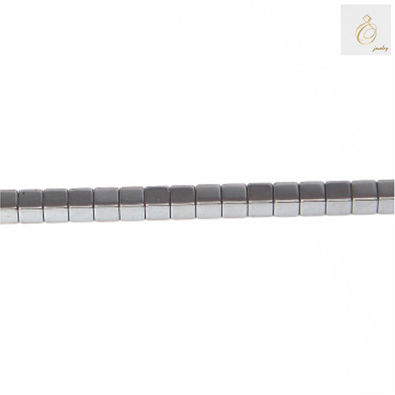 Natural hematite cube beads 3mm with metallic luster arranged on strand, showing uniform square shape and dark gray color perfect for jewelry making