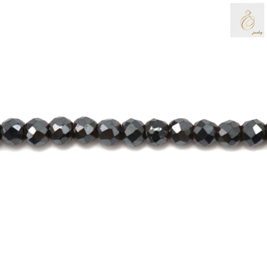 Hematite faceted round beads 4mm diameter with metallic luster, arranged on strand for jewelry making