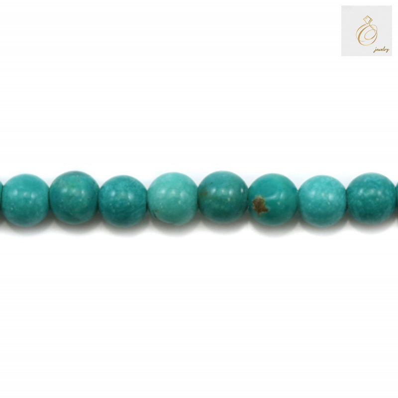 Close-up view of 3mm howlite round beads showing smooth polished surface and consistent sizing