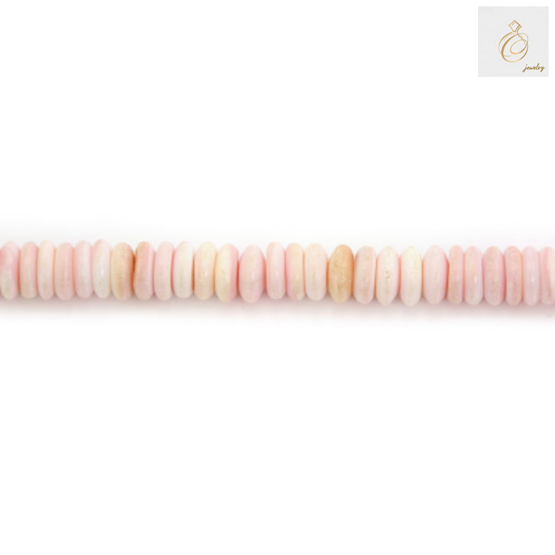 Pink Lambi shell heishi beads 3x6mm size arranged on strand showing natural shell texture and color