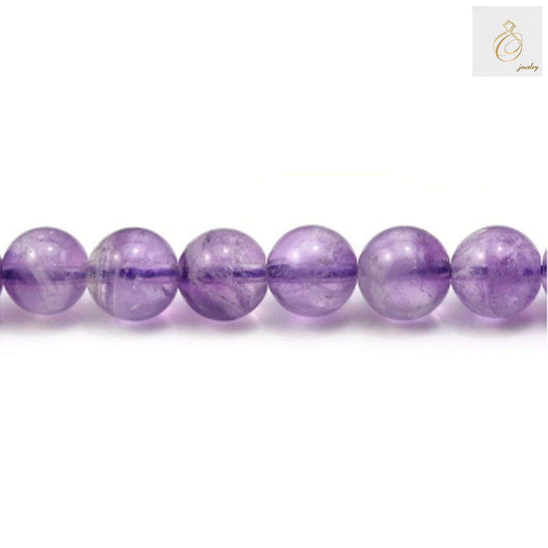 Close-up view of premium light amethyst beads displaying natural purple color and smooth round cut finish