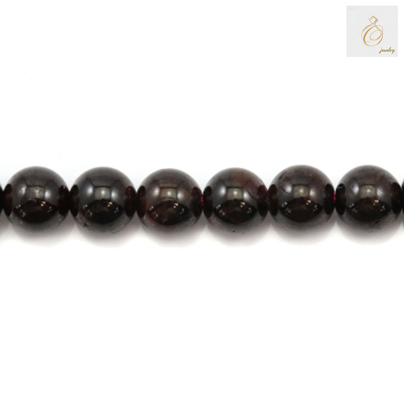 Red garnet gemstone beads arranged in a strand, perfect for DIY jewelry projects"
"Premium quality natural garnet beads, round shape, ideal for necklaces and bracelets