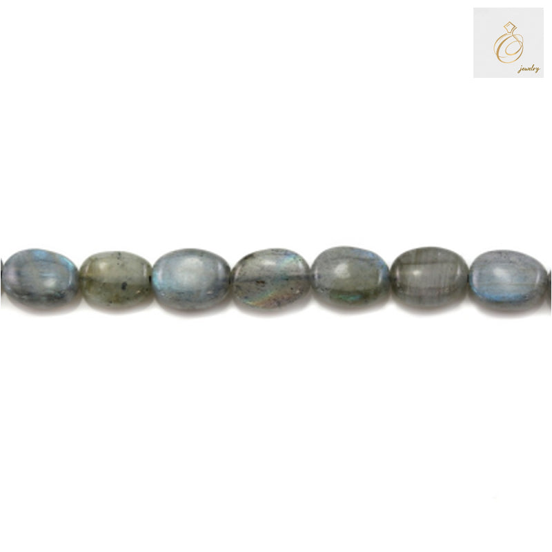 Close-up of labradorite gemstone beads displaying iridescent colors