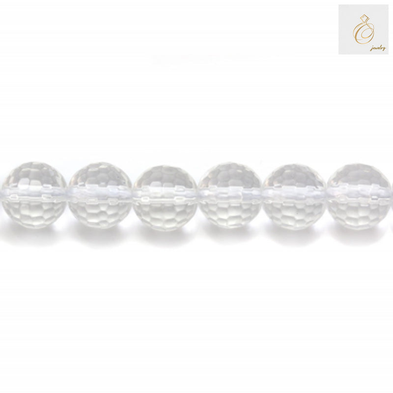 Close-up view of 6mm natural rock crystal beads displaying precise faceted cuts and uniform round shape