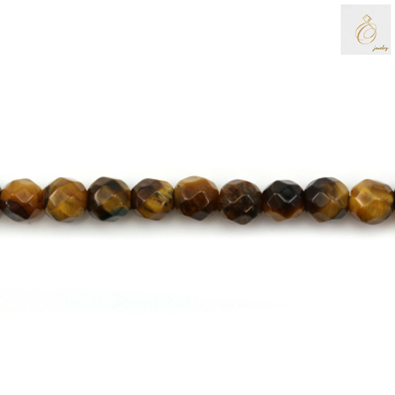 Close-up view of natural yellow tiger's eye beads displaying the distinctive golden striped patterns and faceted surface