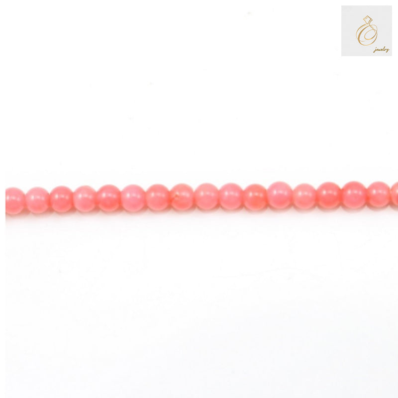 Pink sea bamboo round beads 2mm diameter on white background"
"Natural pink coral beads strand for jewelry making"
"Close-up of pink sea bamboo round beads showing texture and color"
"Pink sea bamboo beads 15.5 inch strand for crafting