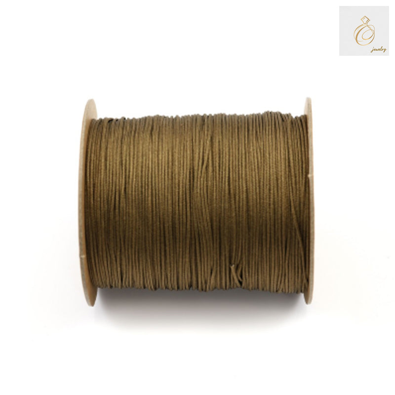 Brown polyester jewelry making cord 1mm diameter on spool"
"Premium brown polyester thread for jewelry crafting 250m length"
"1mm brown polyester cord for bracelet and necklace making"
"Professional jewelry making thread in brown color