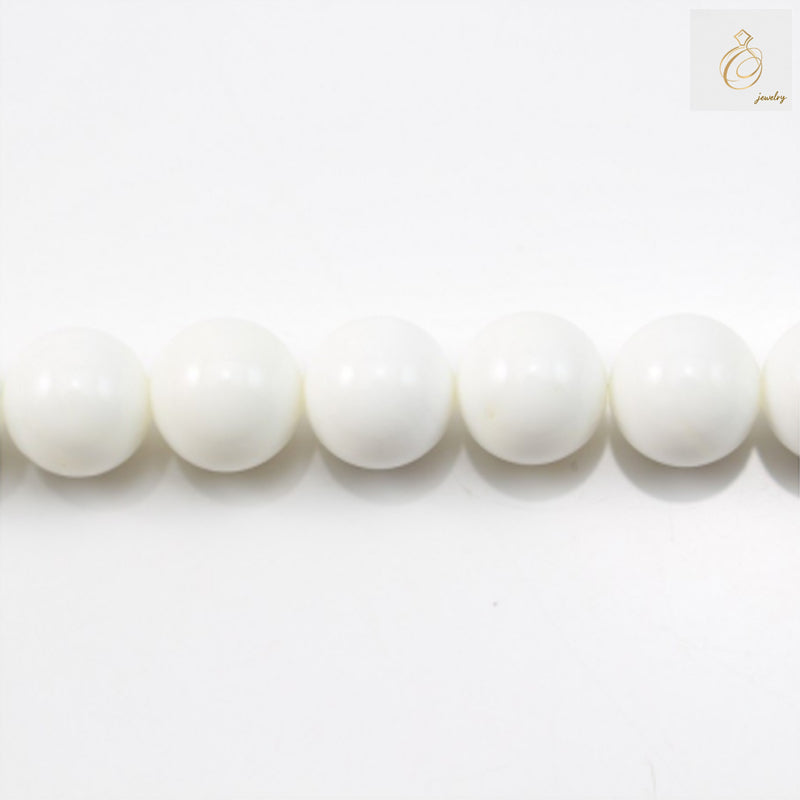 Natural Tridacna shell beads 12mm round on 39-40cm strand for jewelry making"
"Premium quality Tridacna shell beads showing natural patterns and smooth finish