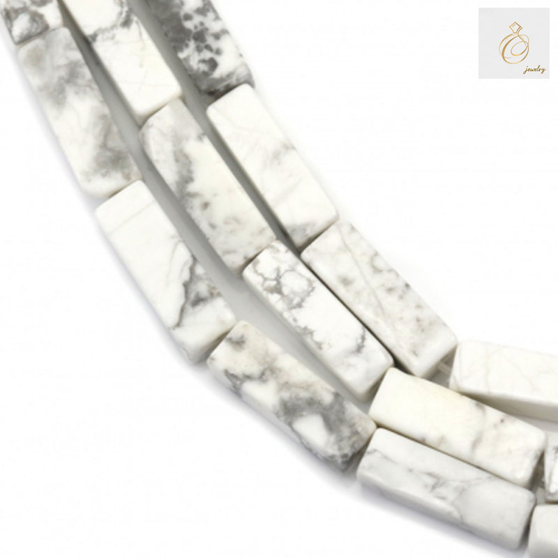 White howlite rectangle beads 4x13mm on 39-40cm strand for jewelry makingClose-up view of white howlite rectangle beads showing 4x13mm size and smooth finish