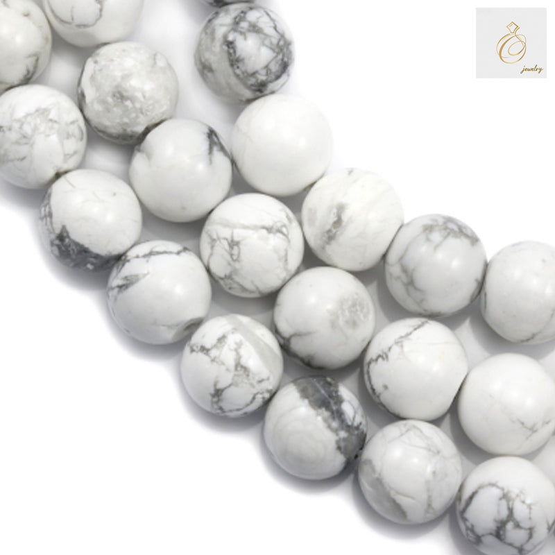 White howlite round beads 12mm diameter on 39cm strand for jewelry making"
"Natural white howlite gemstone beads with smooth polished finish