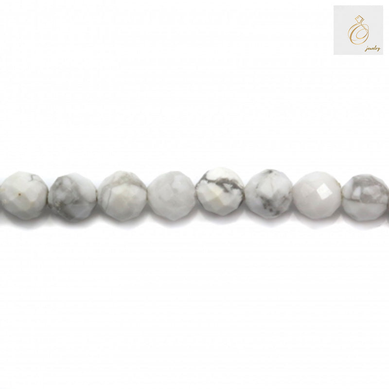 Close-up of 3mm white howlite faceted round beads showing texture and quality