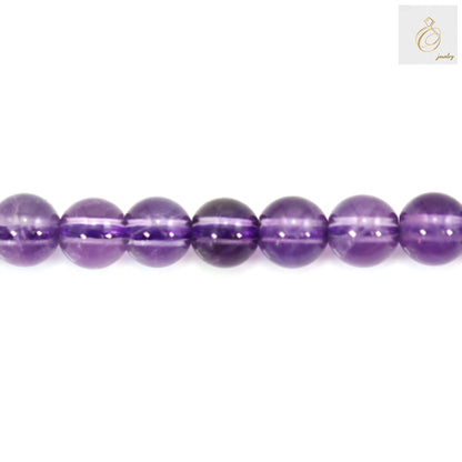 Amethyst round beads 4mm single strand close-up, displaying bead transparency and color gradation