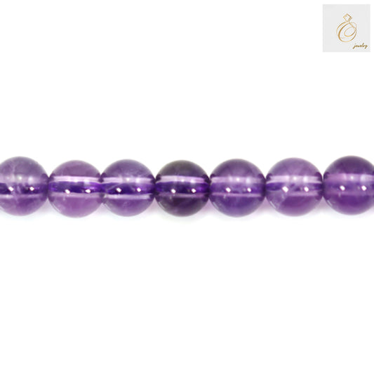 Amethyst round beads 4mm single strand close-up, displaying bead transparency and color gradation