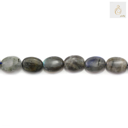 Close-up view of labradorite bead surface showing natural stone texture and color variations
