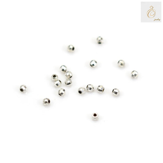 Close-up view of 925 sterling silver faceted ball beads 2.5mm, displaying the detailed faceted cuts and premium silver finish