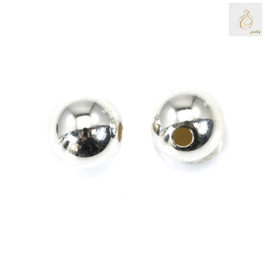 Close-up view of premium 925 sterling silver ball beads with platinum plating, showing smooth spherical surface and quality finish