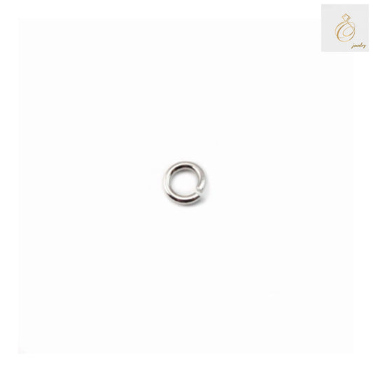 Close-up view of 925 sterling silver open jump rings with platinum plating showing quality and finish