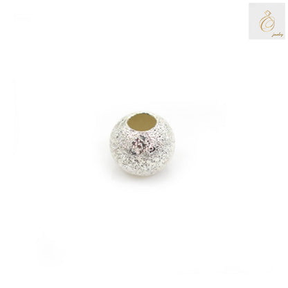Close-up view of 925 sterling silver diamond beads showing detailed craftsmanship and brilliant reflective surface