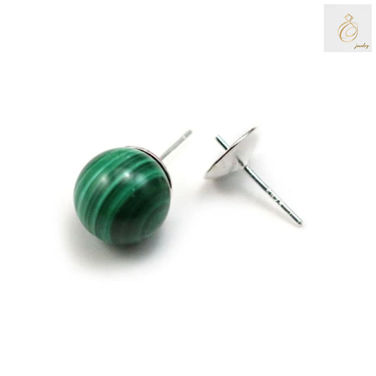 Close-up view of 925 sterling silver earring studs, 8mm diameter, premium jewelry making supplies