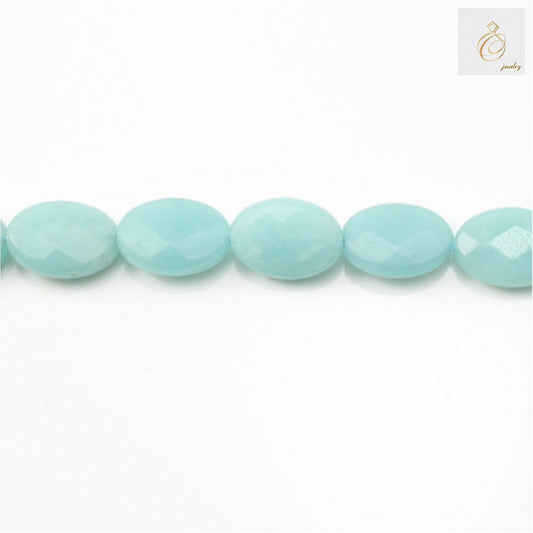 Natural amazonite faceted oval beads 8x10mm arranged on white background showing blue-green color and brilliant cut