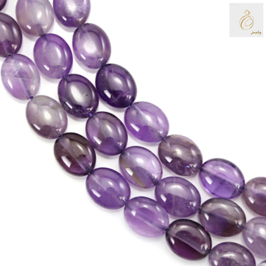 Amethyst oval beads 8x10mm loose display showing varying shades of purple luster