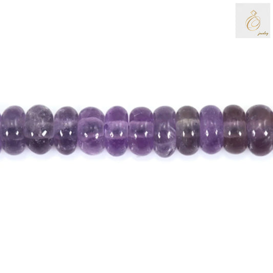 Close-up view of Amethyst Heishi beads 2x4mm strand showing natural purple color variations and smooth finish