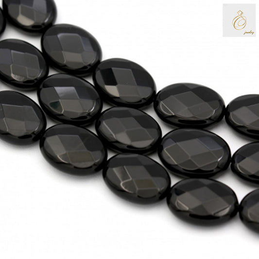 Black Agate faceted oval beads 15x20mm arranged in multiple strands showing the full 38-40cm length and glossy black finish