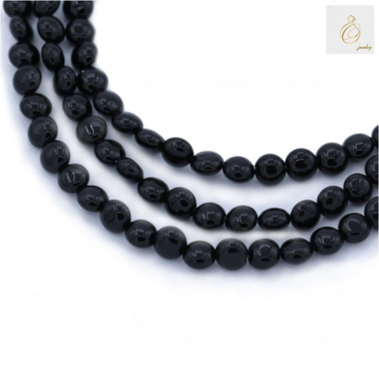 Black Agate Flat Round 6mm Beads - Multiple strands showing premium quality black agate beads for jewelry making