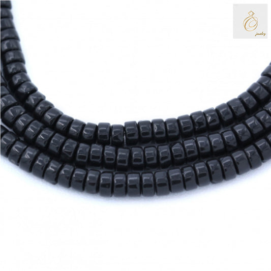 Black Agate Heishi beads 2x4mm size arranged in multiple strands, showing the complete 38-40cm length and uniform cylindrical shape