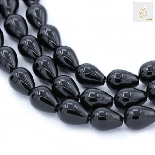 Black Agate Teardrop Gemstone Beads - Multiple strands showing 13x18mm teardrop-shaped beads