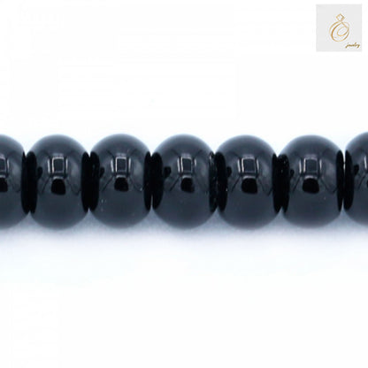 Close-up view of black agate abacus shaped beads showing texture and quality, 4x6mm gemstone beads