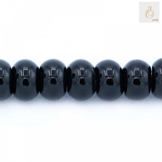 Close-up view of black agate abacus shaped beads showing texture and quality, 4x6mm gemstone beads