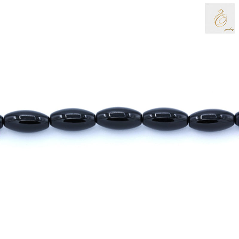 Black Agate Barrel Beads 10x20mm Close-up Detail - Natural Gemstone Strand