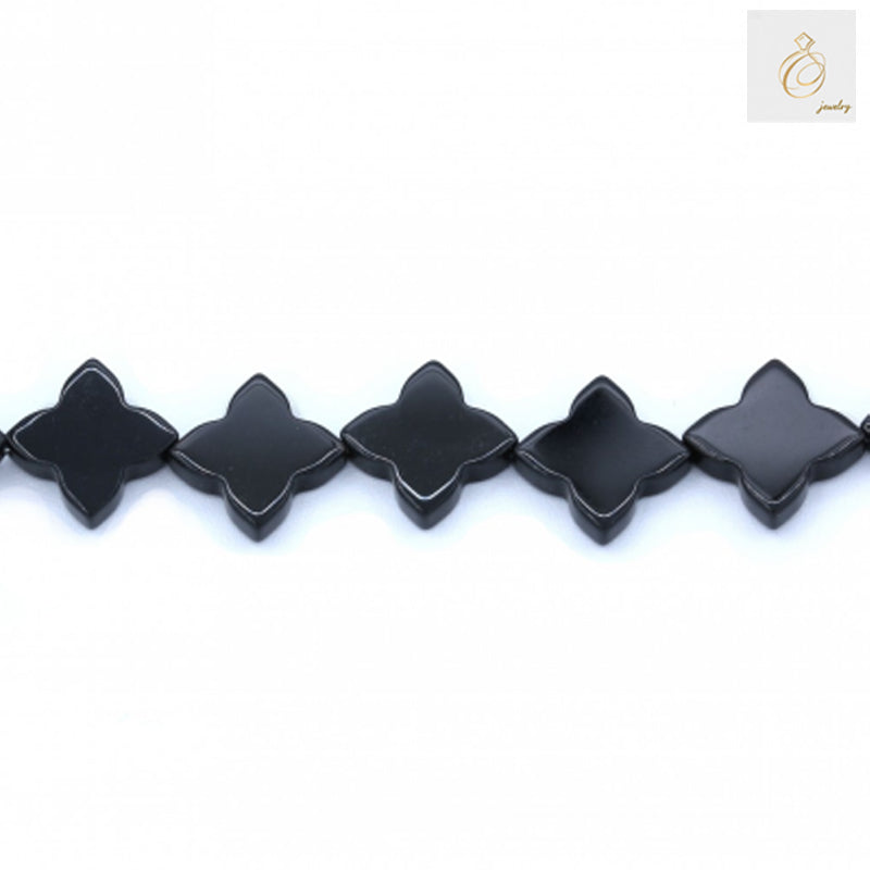 Close-up view of black agate clover beads, 16mm size, detailed texture and pattern