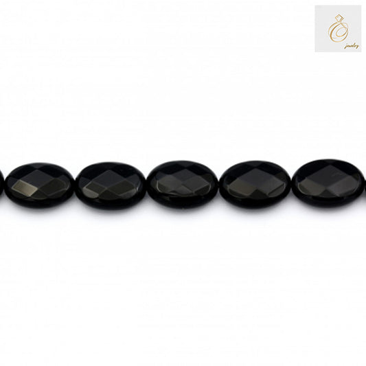 Single strand of Black Agate faceted oval beads 15x20mm displaying the uniform size and faceted cut detail