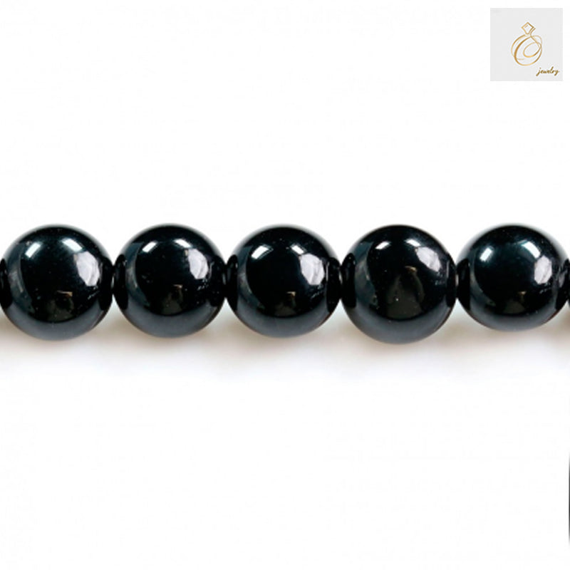 Black Agate Flat Round 6mm Beads Close-up - High quality glossy black agate beads detail view