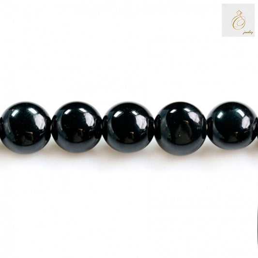 Black Agate Flat Round 6mm Beads Close-up - High quality glossy black agate beads detail view