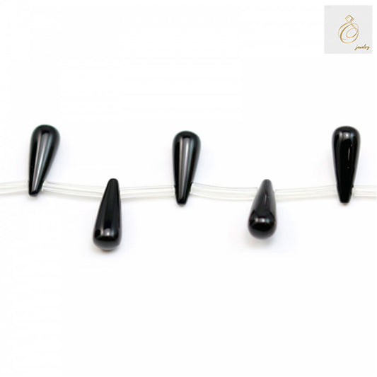 Black agate teardrop beads 6x16mm strung on clear thread showing 38-40cm strand length for jewelry making