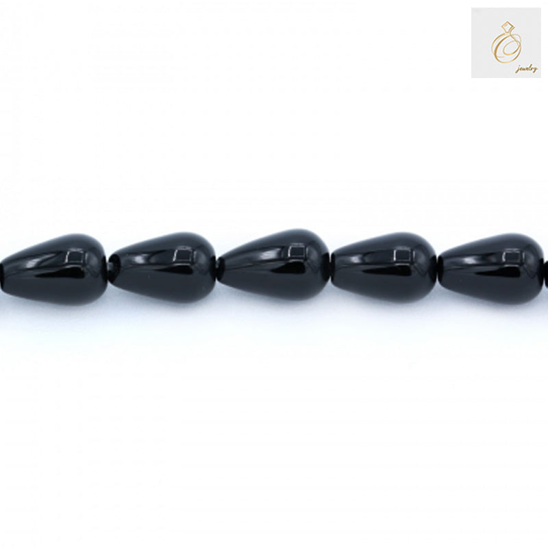 Black Agate Teardrop Beads 8x12mm - Close-up view of individual teardrop-shaped black agate stones on strand