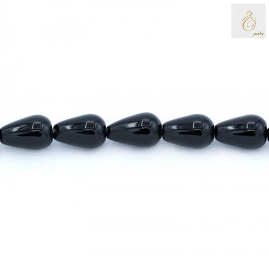 Black Agate Teardrop Beads 8x12mm - Close-up view of individual teardrop-shaped black agate stones on strand