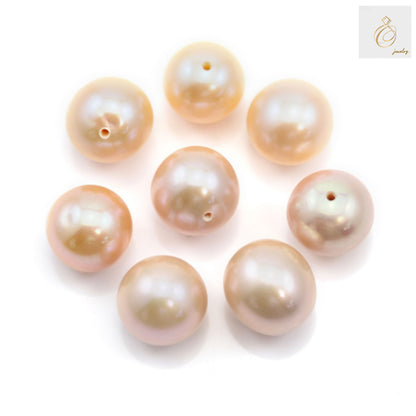 Champagne freshwater cultured pearls half drilled round 6-6.5mm - detailed view showing size and drilling