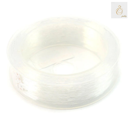 Premium 1.0mm elastic thread roll, 28 meters length for jewelry making and crafts"
"Clear elastic beading thread 1.0mm diameter on white background"
"High-quality elastic cord for bracelet and necklace making, 28m roll