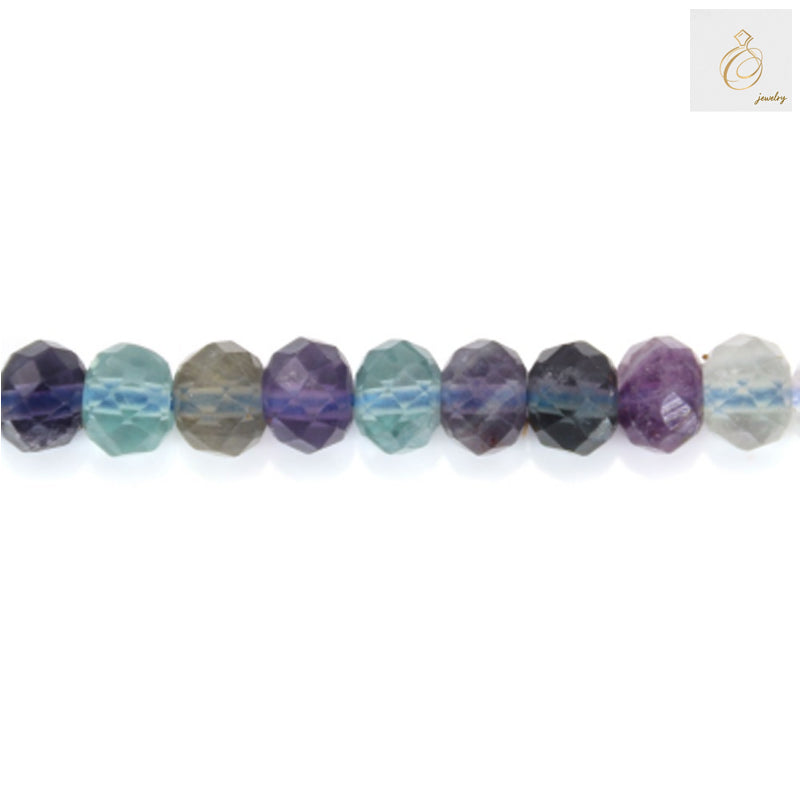 Close-up view of fluorite faceted abacus beads showing precision cut and 0.8mm holes"